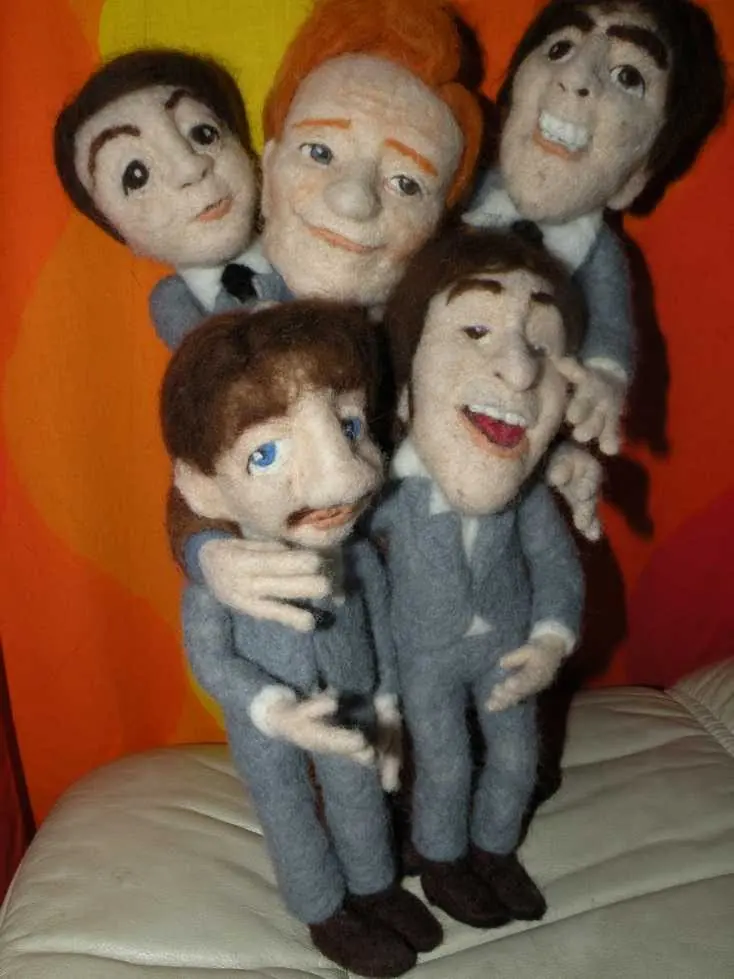 Needle-felted Beatles dolls in a group hug by Kay Petal